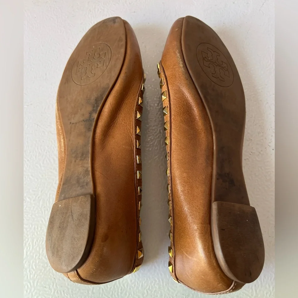 Tory Burch Camel Brown Leather Flats with gold grommet accents